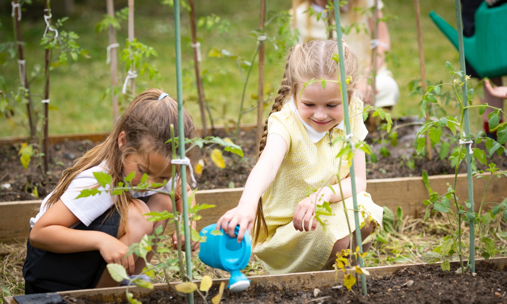 White House Academy Image of two pupils in Forest School