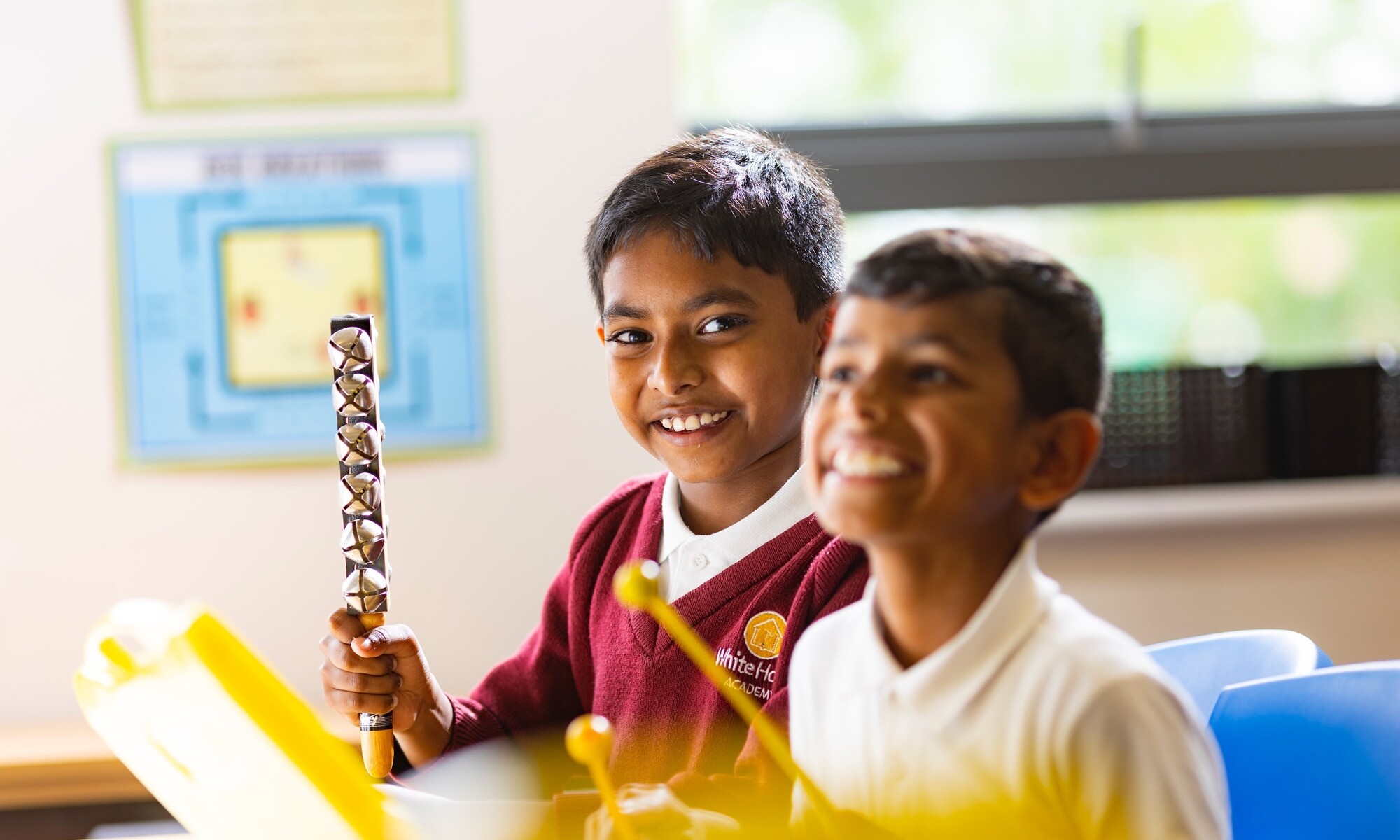White House Academy Image of Two Students in a Music Lesson