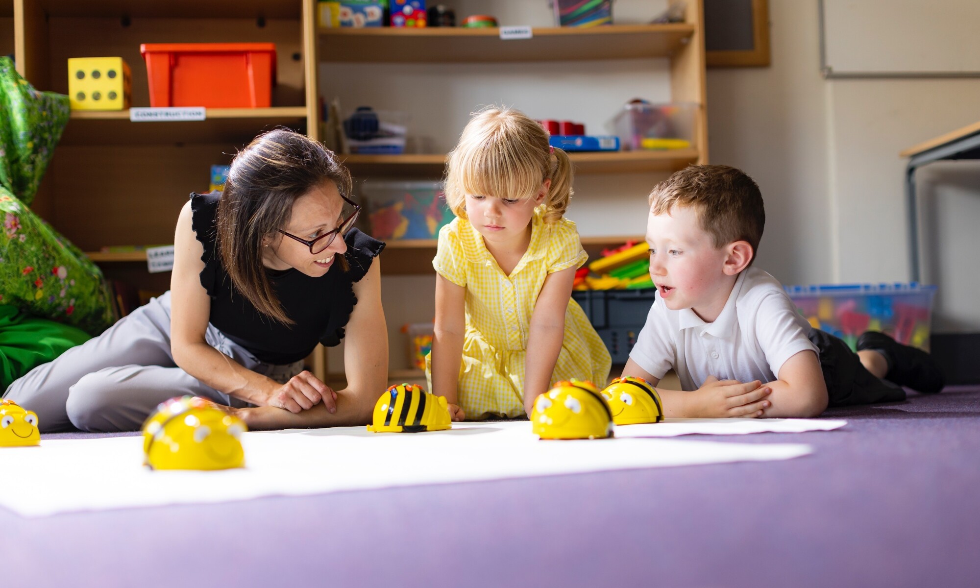 White House Academy Image of two pupils and teacher